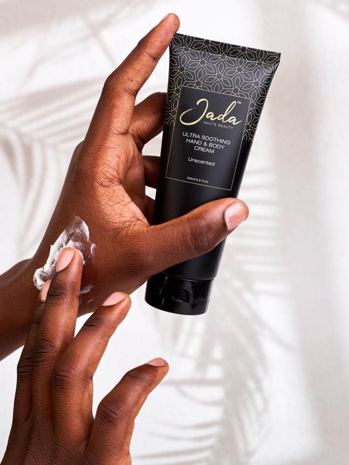 Rich moisturizing application of Jada Ultra Soothing Hand and Body Cream for deep skin hydration.